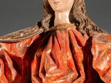 a statue of a woman with a crown on her head