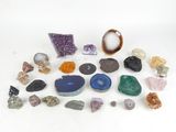 a group of rocks and stones on a white surface