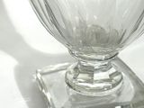 a clear glass bowl with a diamond pattern on it