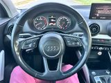 steering view of a car with a dashboard and dashboard gauges