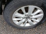 a close up of a tire on a car