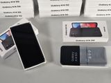 boxes of samsung galaxy a4s and a galaxy a5s are on a table