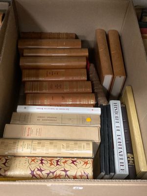 a box full of books that are sitting on a table
