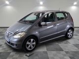 the mercedes b - class is parked on a checkered floor