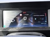 a digital display on the dashboard of a car