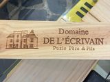 a wooden sign that says domaine de beckian on it