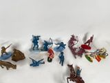 a lot of toy figurines that are on the table