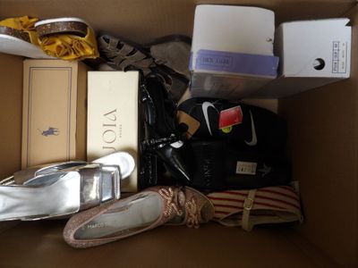 a box full of shoes and other items in it