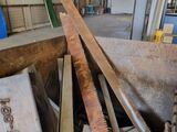 many pieces of wood that have been cut and are stacked together