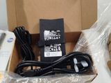 a box with a remote control and other items in it