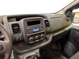 a dashboard view of a vehicle with a steering wheel