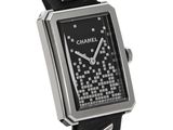 a black and silver watch that is on a black strap