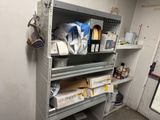 a shelf with many items on it in a room