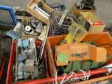 a pile of assorted items sitting in a box