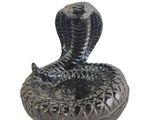 an image of a black cobra statue on a white background