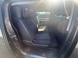 a car that has a seat in the back of it
