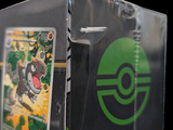 a box with a pokemon trading card inside of it
