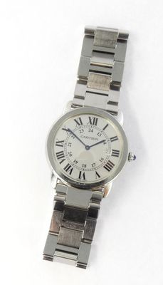 an image of a silver wrist watch with roman numerals on it