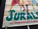 a sign that says jurals on the side of a table