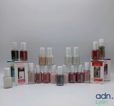many bottles of nail polish on the table
