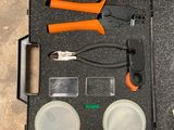 a tool kit that includes pliers, wire cutters, pliers, and other tools