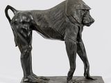 an image of a bronze statue of a monkey on a marble base