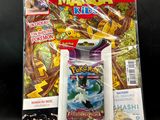 un gros plan sur un paquet de cartes Pokémon et un magazine