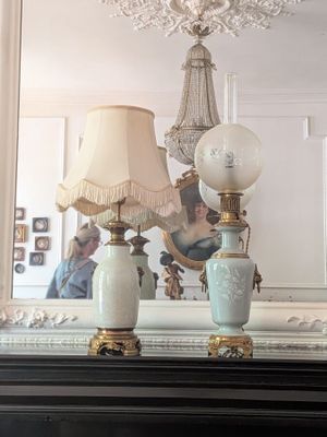 two lamps that are sitting on top of a dresser
