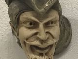 a statue of a man with a hat on his head