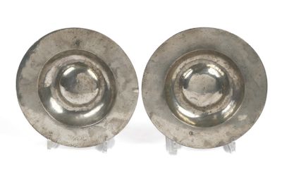 pair of silver plated candlesticks on stands on a white background