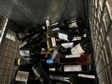 many bottles of wine in a metal container