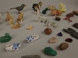 a lot of figurines that are on the table