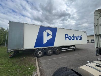 a semi truck that is parked in a parking lot