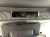a close up of a cell phone in a car
