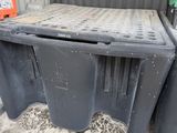 a picture of a trash can with a clock on top of it
