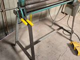 an image of a machine that is sitting in a garage