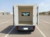 an image of a white truck parked in a parking lot