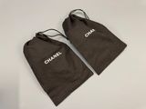 a pair of black bags with the words chan on them