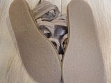 a pair of shoes that are on the floor