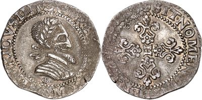 une pièce d'argent portant l'image d'un homme