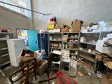 a room with a lot of clutter and boxes on the shelves