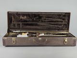 a case with a trumpet inside of it on a table