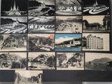 many pictures of a bunch of old buildings on the wall