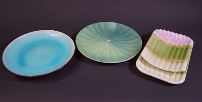 three plates that are sitting next to each other on a table