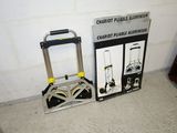 two luggage carts sitting next to each other on the floor