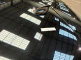 a reflection of a car on the hood of a car