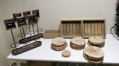 a white table topped with wooden slices of bread