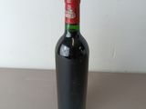 a bottle of wine that is sitting on a table
