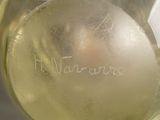 a close up of a glass of wine with a label on it