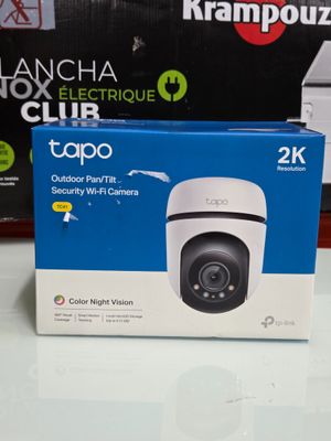 a box with a camera inside of it sitting on a table
